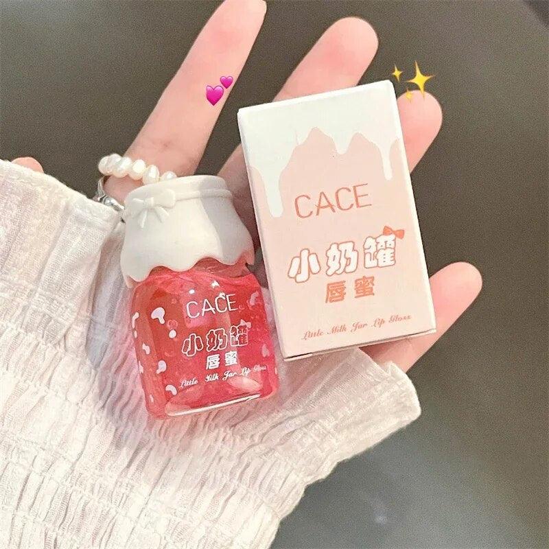 CACE Milk Jar Lipgloss: Peach Glitter Lip Plumper.